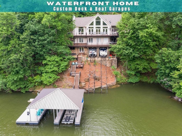 view of dock with a water view and stairs