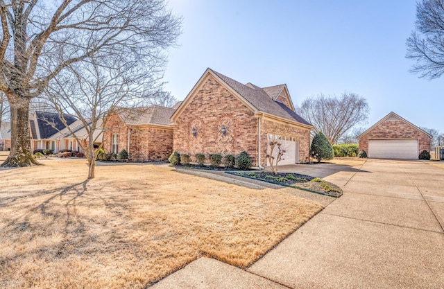 view of front of house featuring a garage and brick siding