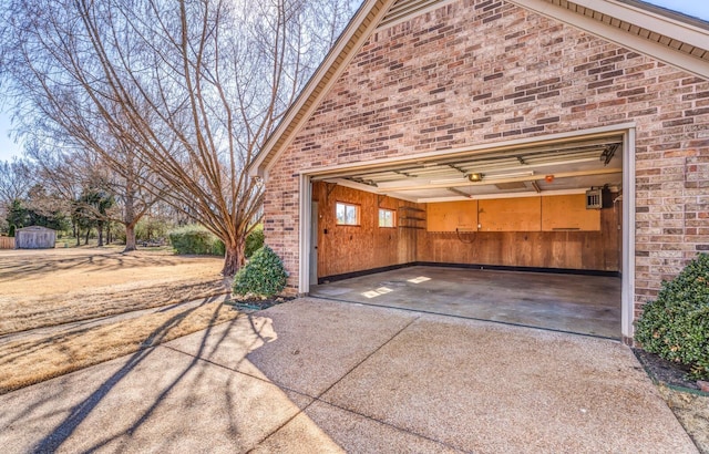 garage with a storage shed