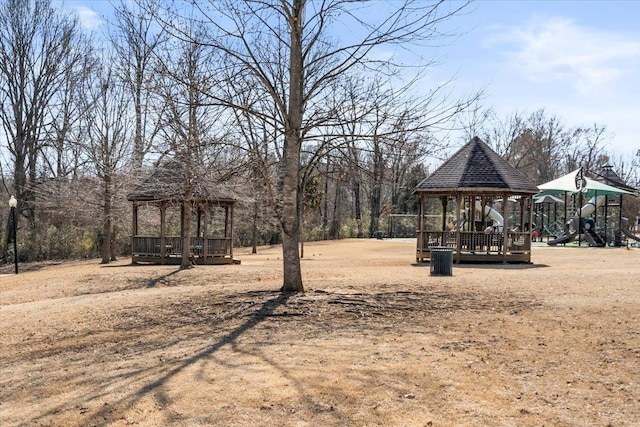 view of yard with a gazebo and playground community