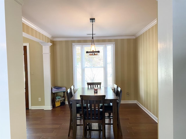 dining room with dark wood-style floors, visible vents, ornamental molding, baseboards, and wallpapered walls