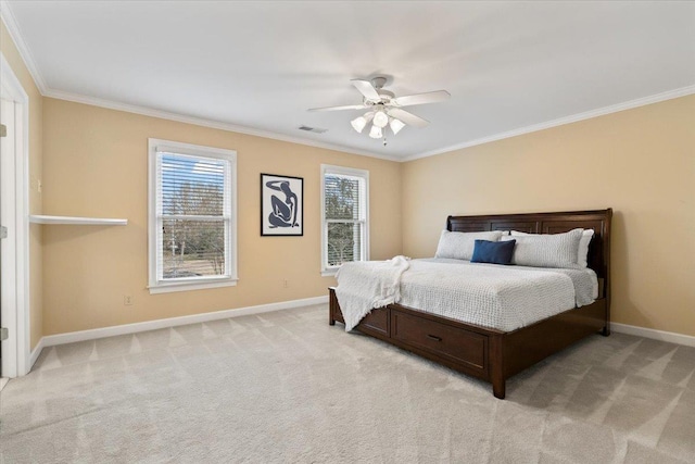 bedroom with light carpet, visible vents, baseboards, and crown molding