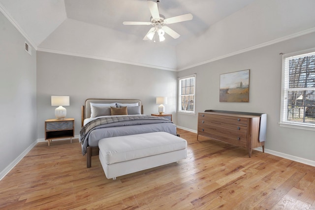 bedroom featuring light wood-type flooring, visible vents, crown molding, and multiple windows