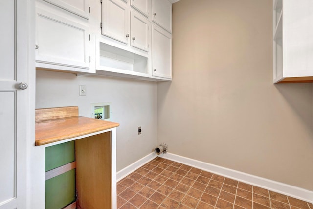 laundry area with washer hookup, cabinet space, baseboards, and electric dryer hookup