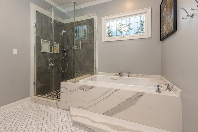 bathroom with baseboards, a marble finish shower, a bath, tile patterned floors, and crown molding