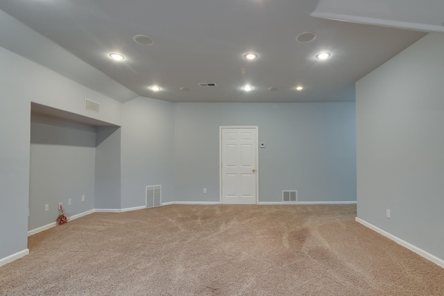 carpeted spare room with recessed lighting and visible vents