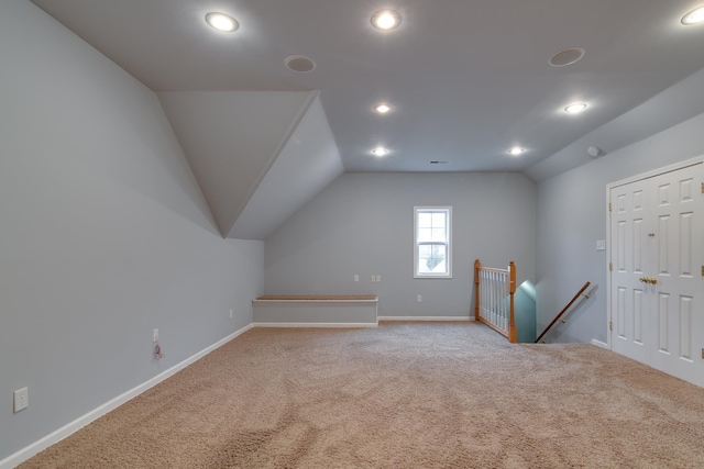 bonus room featuring carpet, baseboards, vaulted ceiling, and recessed lighting