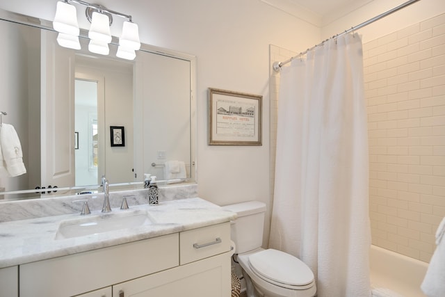 bathroom with shower / tub combo, vanity, and toilet