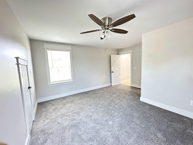 unfurnished bedroom with carpet floors, ceiling fan, and baseboards