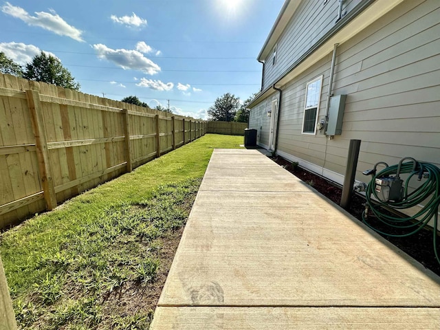 view of yard featuring cooling unit and a fenced backyard