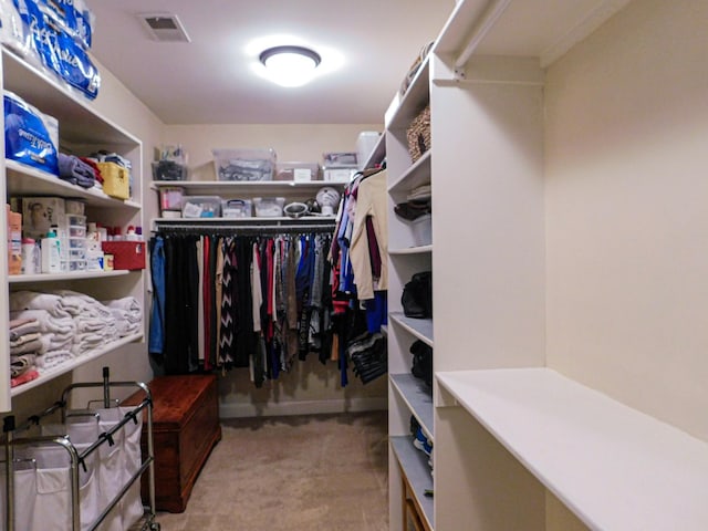 walk in closet with visible vents