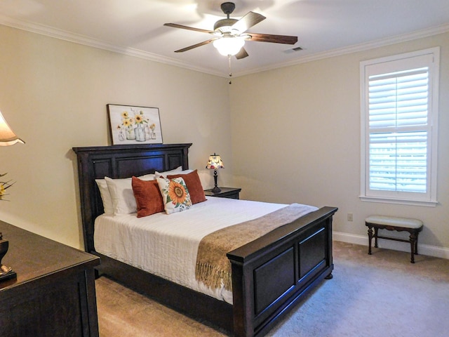 bedroom with crown molding, baseboards, visible vents, and light colored carpet