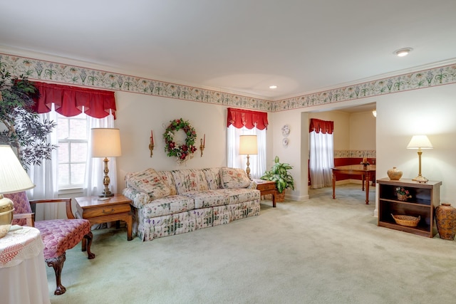 carpeted living area featuring crown molding