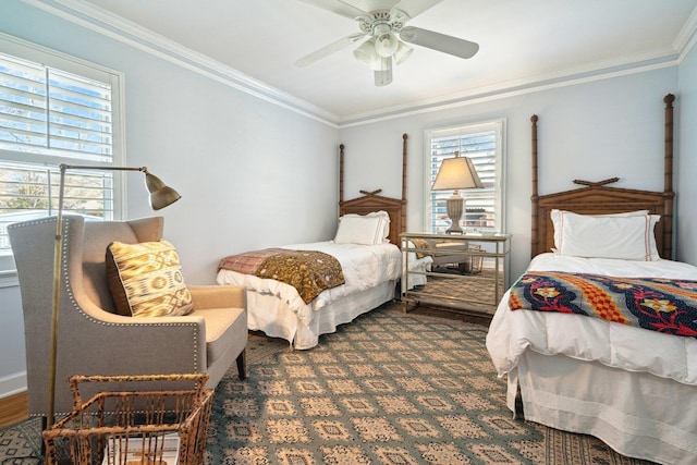 bedroom with ceiling fan and crown molding