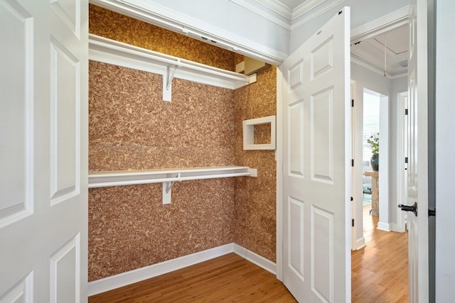 interior space with attic access and wood finished floors