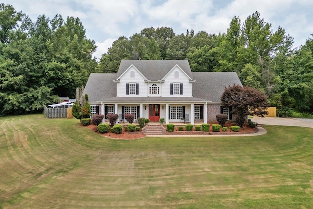 view of front of house featuring a front lawn and a porch