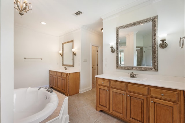 bathroom with tile patterned floors, two vanities, ornamental molding, a sink, and a bath