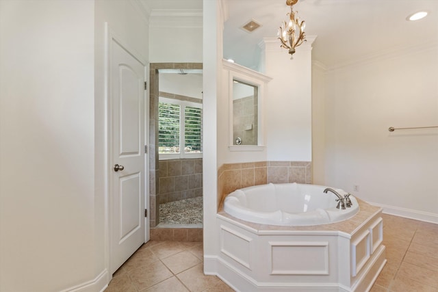 bathroom featuring a garden tub, tiled shower, tile patterned floors, and crown molding