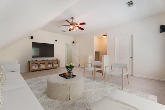 living room featuring light carpet, baseboards, visible vents, and a ceiling fan