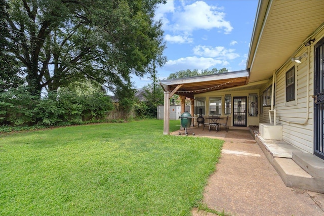 view of yard with a patio area and fence