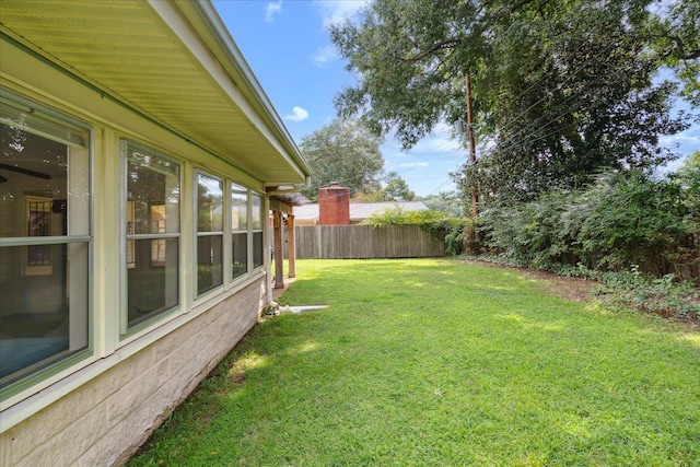 view of yard featuring fence