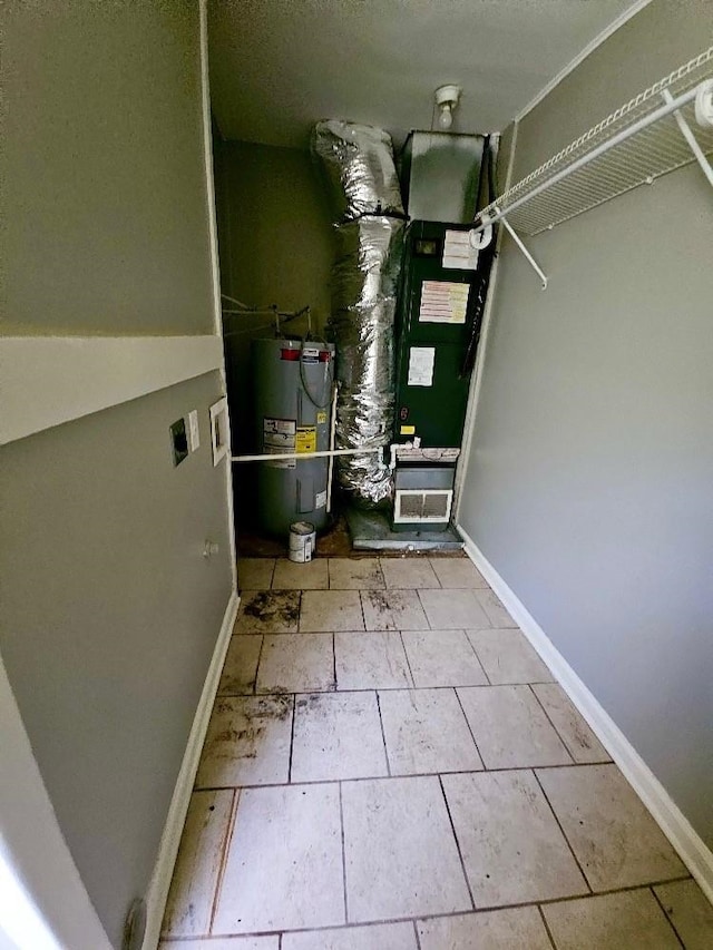 utility room with water heater