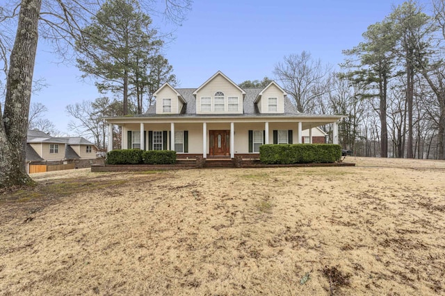 country-style home with covered porch