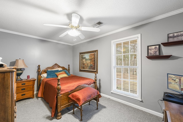 carpeted bedroom featuring a textured ceiling, ornamental molding, visible vents, and baseboards