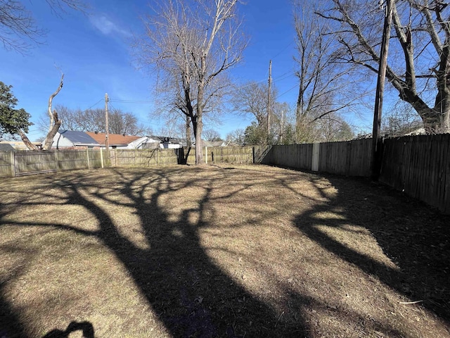 view of yard featuring a fenced backyard