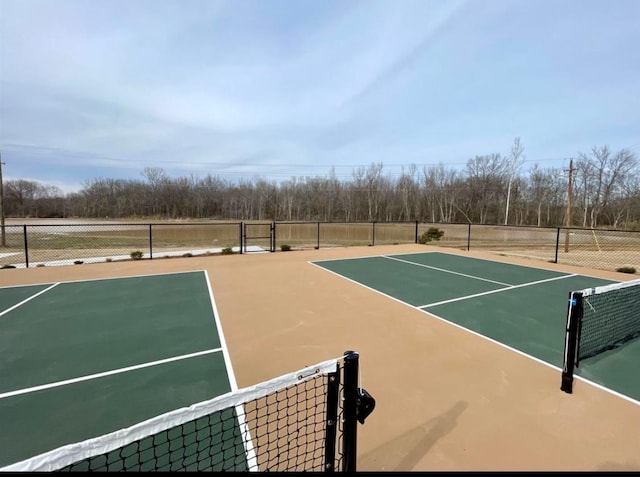 view of sport court with community basketball court and fence