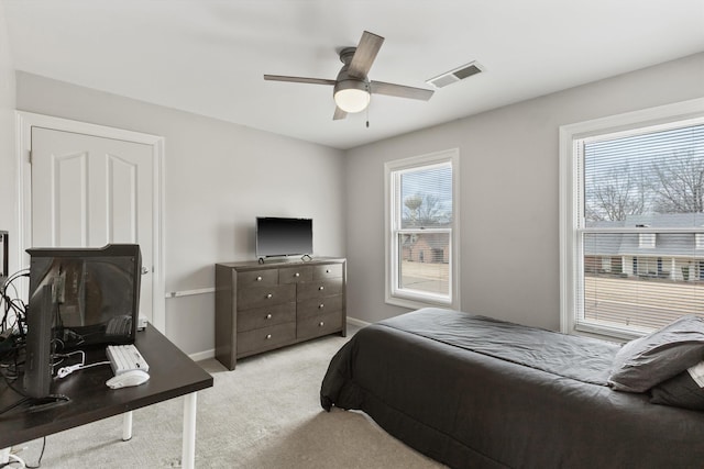 bedroom featuring carpet, visible vents, ceiling fan, and baseboards