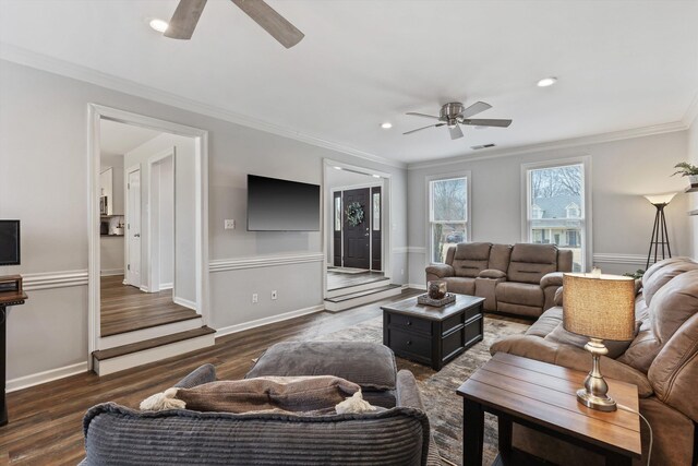 living area with baseboards, ceiling fan, ornamental molding, dark wood-style flooring, and recessed lighting