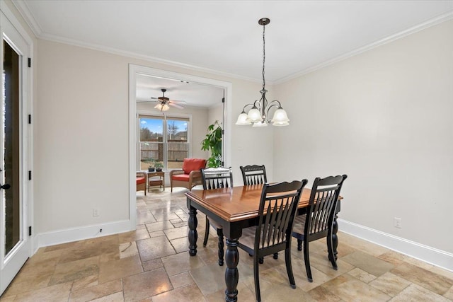 dining area featuring an inviting chandelier, baseboards, stone tile flooring, and ornamental molding