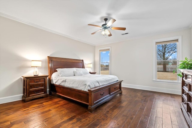 bedroom featuring ornamental molding, dark wood finished floors, visible vents, and baseboards