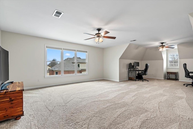 office with visible vents, light carpet, and baseboards