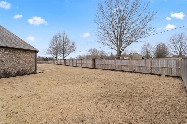 view of yard featuring fence