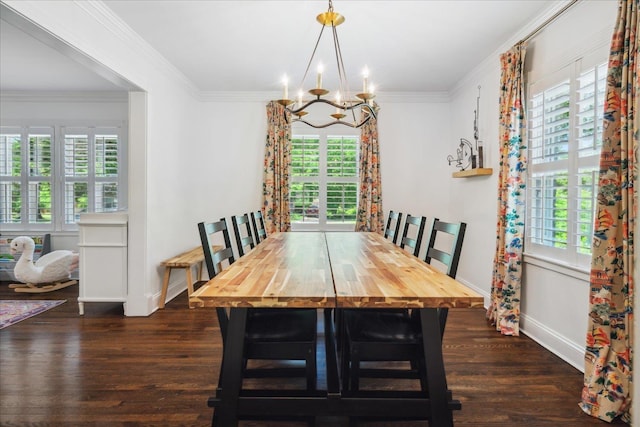 dining space featuring baseboards, ornamental molding, dark wood-style flooring, and a notable chandelier