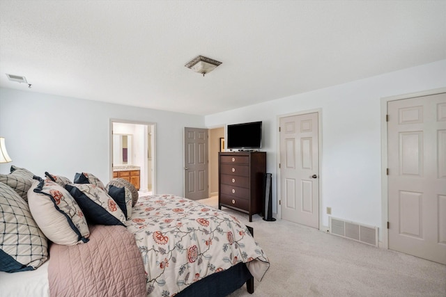 bedroom featuring light colored carpet, visible vents, and connected bathroom