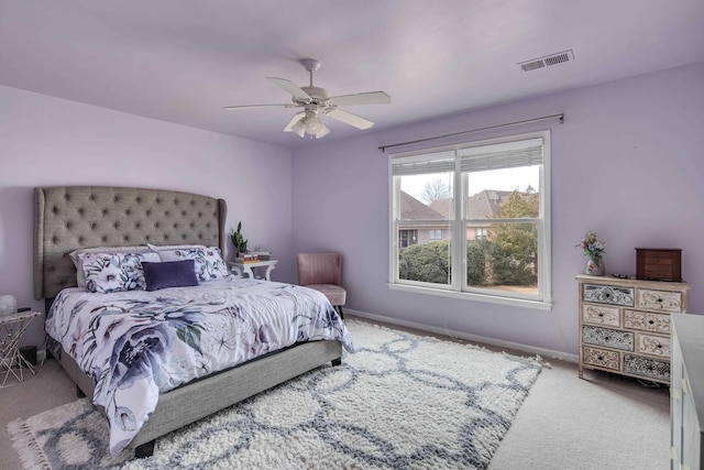 bedroom featuring carpet, visible vents, ceiling fan, and baseboards