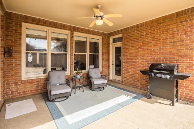 view of patio / terrace featuring a grill and ceiling fan