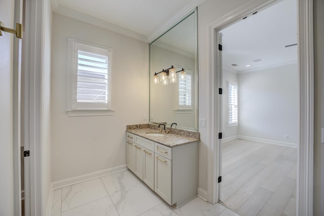 bathroom with visible vents, baseboards, marble finish floor, crown molding, and vanity