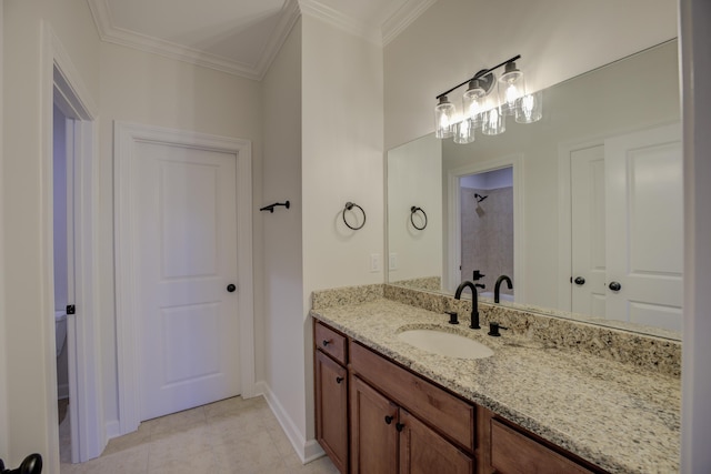 full bath with a shower, ornamental molding, vanity, tile patterned flooring, and baseboards