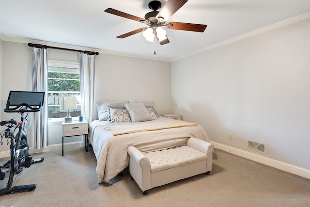 bedroom with baseboards, ornamental molding, visible vents, and light colored carpet