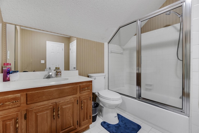 full bath with wallpapered walls, bath / shower combo with glass door, toilet, a textured ceiling, and vanity