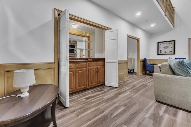 interior space with light wood-type flooring, visible vents, and recessed lighting