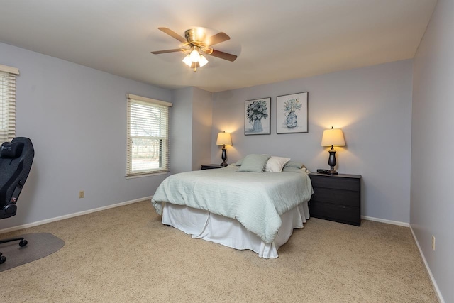 bedroom featuring ceiling fan, carpet floors, and baseboards