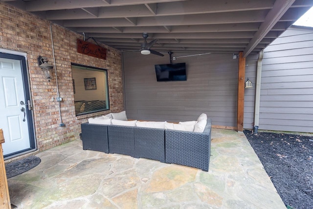 view of patio with an outdoor hangout area and ceiling fan