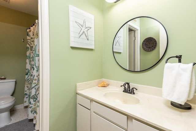 bathroom with toilet, tile patterned floors, visible vents, and vanity