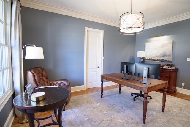 home office featuring ornamental molding, wood finished floors, baseboards, and an inviting chandelier