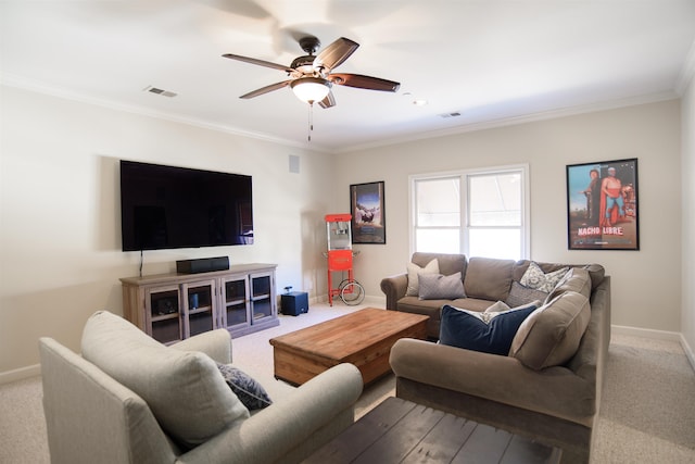 carpeted living area featuring baseboards, visible vents, ceiling fan, and ornamental molding